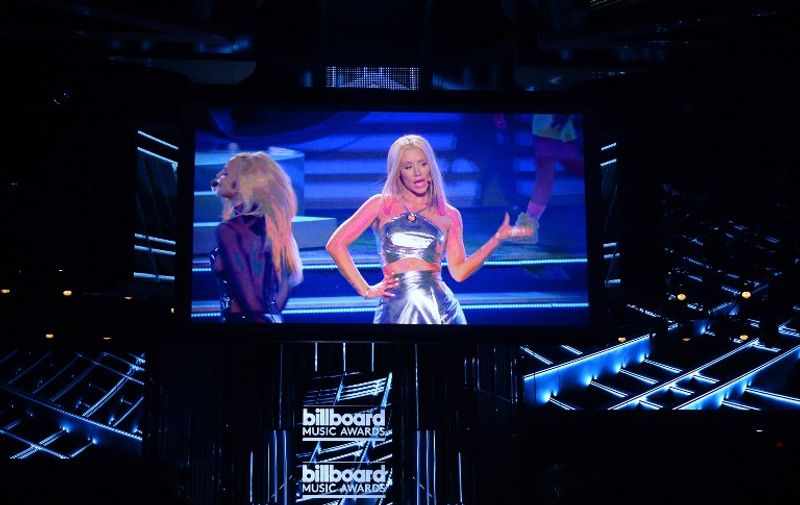 LAS VEGAS, NV - MAY 17: Recording artists Britney Spears (L) and Iggy Azalea are shown on screen performing during the 2015 Billboard Music Awards at MGM Grand Garden Arena on May 17, 2015 in Las Vegas, Nevada.   Ethan Miller/Getty Images/AFP