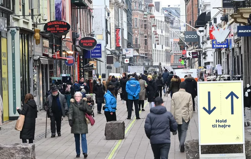 People are pictured in the center of Copenhagen, on March 1, 2021 as stores reopen after several months of closing, amid the ongoing coronavirus Covid-19 pandemic. (Photo by Philip Davali / Ritzau Scanpix / AFP) / Denmark OUT