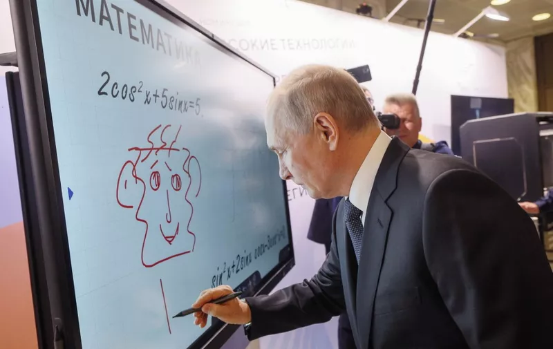 Russian President Vladimir Putin tours an exhibition of perspective Russian brands during the Strong Ideas for a New Time forum in Moscow on June 29, 2023. (Photo by Gavriil GRIGOROV / SPUTNIK / AFP)
