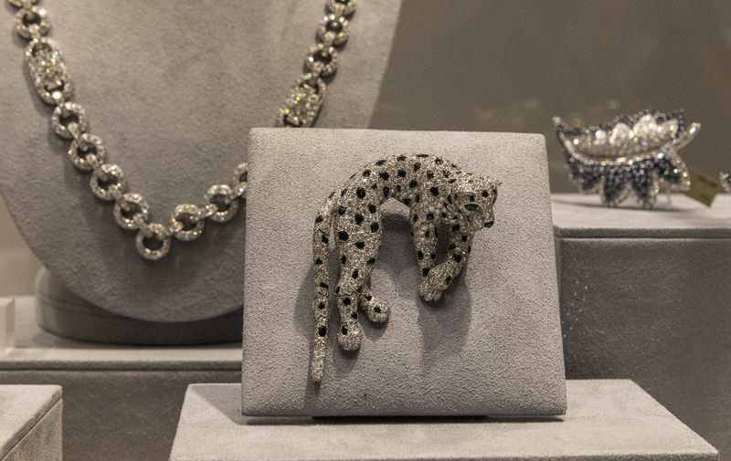 A Cartier diamond, onyx and emerald Panther Clip-Brooch is displed during a press preview before Christies Luxury Week auction, in New York on December 3, 2021. (Photo by KENA BETANCUR / AFP)