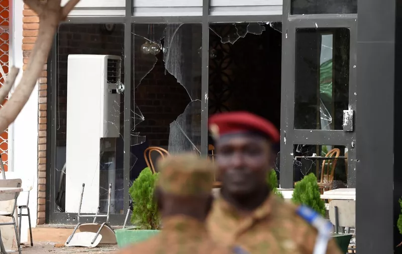 A picture taken on August 15, 2017 shows broken windows and damage at the Aziz Istanbul Turkish restaurant in Ouagadougou, the site of a terrorist attack, during a visit by Mali's and Burkina Faso's Presidents. Eighteen people, including at least eight foreigners were shot dead in a Turkish restaurant in Burkina Faso, according to a provisional toll on August 14, in the latest attack in West Africa to target a spot popular with expatriates. (Photo by SIA KAMBOU / AFP)