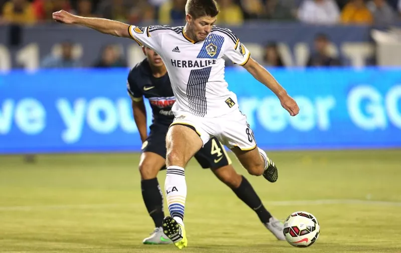 LOS ANGELES, CA - JULY 11: Steven Gerrard #8 of the Los Angeles Galaxy takes a shot on goal against Club America in the International Champions Cup 2015 at StubHub Center on July 11, 2015 in Los Angeles, California.   Stephen Dunn/Getty Images/AFP