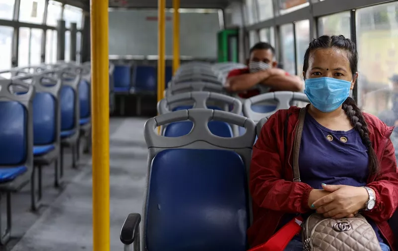 Passengers wearing a face mask and maintaining social distancing in the bus. Passengers will get access to sanitizer and mask is compulsory.
Coronavirus outbreak, Kathmandu, Nepal - 16 Jul 2020,Image: 543796199, License: Rights-managed, Restrictions: , Model Release: no