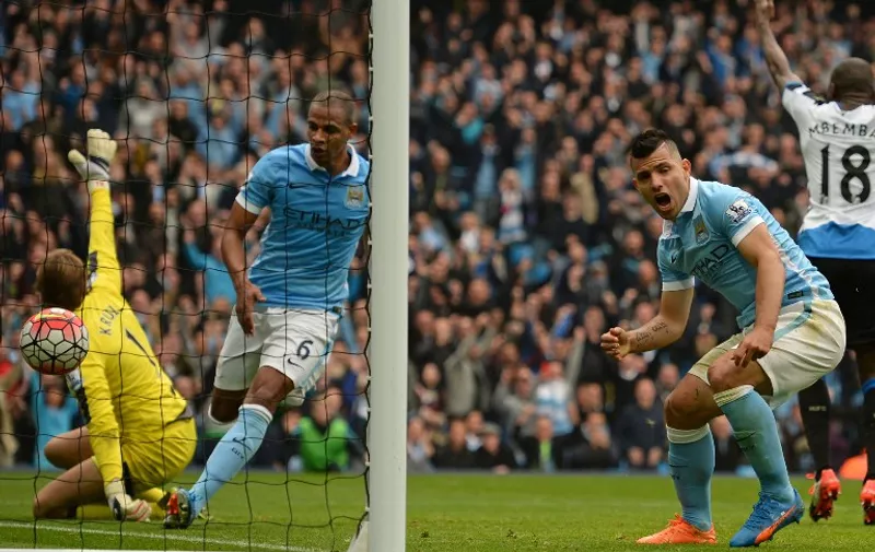 Manchester City's Argentinian striker Sergio Aguero (R) reacts after scoring their first goal during the English Premier League football match between Manchester City and Newcastle United at The Etihad Stadium in Manchester, north west England on October 3, 2015.
RESTRICTED TO EDITORIAL USE. No use with unauthorized audio, video, data, fixture lists, club/league logos or 'live' services. Online in-match use limited to 75 images, no video emulation. No use in betting, games or single club/league/player publications.