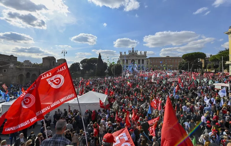 A general view shows people attending an anti-fascist rally called by Italian Labour unions CGIL, CISL and UIL at Piazza San Giovanni in Rome on October 16, 2021, a week after a demonstration against the so-called Green Pass degenerated into an assault on the CGIL trade union building, led by the neo-fascist Forza Nuova party. (Photo by Alberto PIZZOLI / AFP)