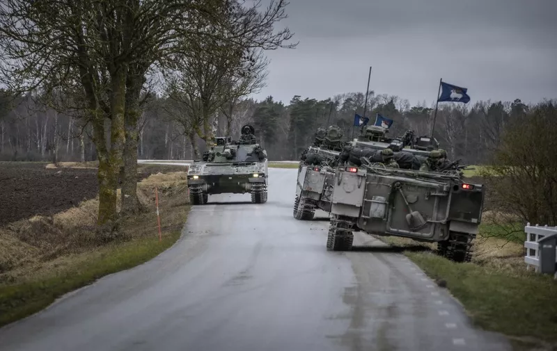 Gotland's Regiment patrols in tanks on the roads in nothern Gotland on January 16, 2022. - Sweden deployed armoured combat vehicles and armed soldiers to patrol streets on the island of Gotland in response to increased "Russian activity" in the region. (Photo by Karl MELANDER / various sources / AFP) / Sweden OUT