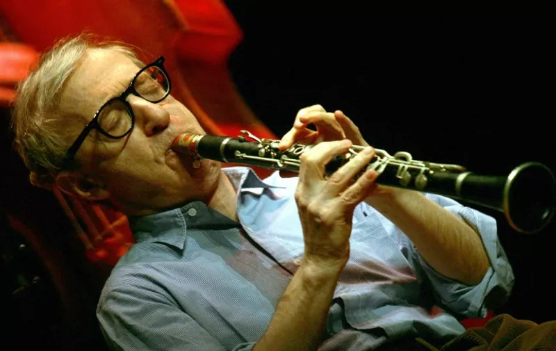 Legendary US movie star and director Woody Allen playing the clarinet during Woddy Allen and his New Orleans Jazz Band`s New Year concert at Lutfi Kirdar Congress and Exhibition Palace Anatolian Hall in Istanbul, 29 December 2005.  AFP PHOTO/MUSTAFA OZER