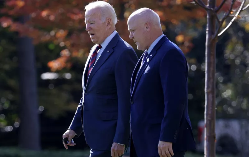 WASHINGTON, DC - NOVEMBER 16: U.S. President Joe Biden (L) walks to Marine One with Senior Advisor &amp; Infrastructure Act Implementation Coordinator Mitch Landrieu before departing from the South Lawn of the White House November 16, 2021 in Washington, DC. President Biden is traveling to Woodstock, New Hampshire to visit the NH 175 bridge over the Pemigewasset River to discuss the bipartisan infrastructure legislation.   Alex Wong/Getty Images/AFP (Photo by ALEX WONG / GETTY IMAGES NORTH AMERICA / Getty Images via AFP)