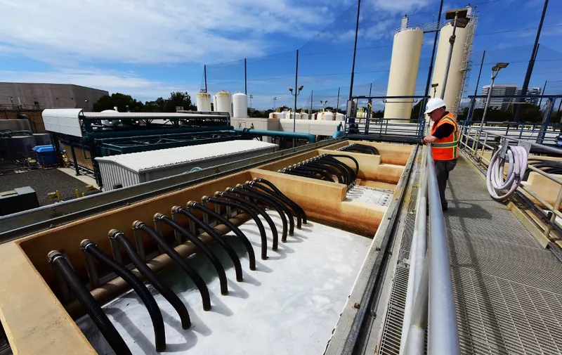 Waste water is cleansed in the preliminary stage of recycling at the West Basin Municipal Water District (WBMWD) water recycling facility in El Segundo, California, September 14, 2015.  As drought-stricken California struggles with water conservation, West Basin employs a three-part water purification system involving microfiltration, reverse osmosis and ultraviolet light treatment to transform waste water into potable water. The finished product is then sent underground to replenish the areas aquifers where it mixes with the natural underground water supply which feeds wells.  Critics call the method toilet to tap but the final product is more pure than tap or bottled water and exceeds all state and federal drinking water standards according to WBMWD.  AFP PHOTO / ROBYN BECK.  AFP PHOTO / ROBYN BECK (Photo by ROBYN BECK / AFP)