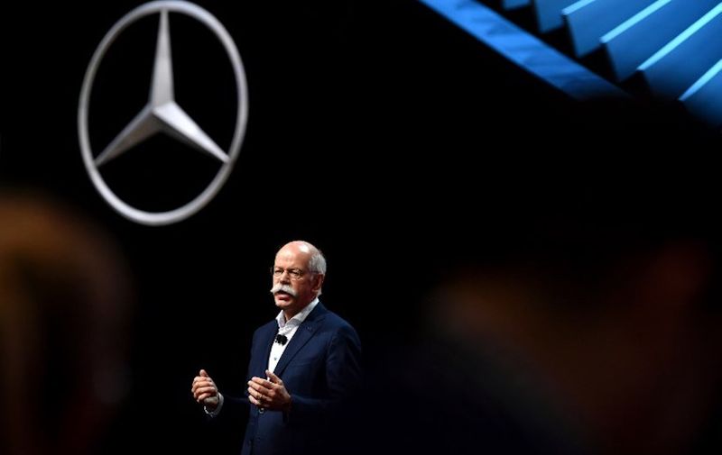 Dieter Zetsche, Daimler AG Board of Management Chairman speaks at the German car maker's booth during a press day ahead of the Geneva International Motor Show on March 6, 2018 in Geneva. 
The show opens to the public on March 8 and runs through March 18. / AFP PHOTO / HAROLD CUNNINGHAM