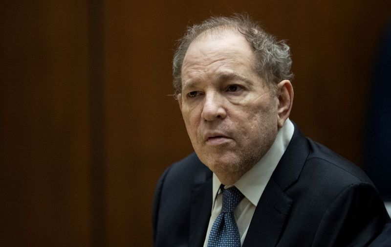 (FILES) In this file photo taken on October 4, 2022 former film producer Harvey Weinstein appears in court at the Clara Shortridge Foltz Criminal Justice Center in Los Angeles. - Disgraced movie industry tycoon Harvey Weinstein is due to be sentenced February 23, 2023, over the rape of a woman in a Beverly Hills hotel room a decade ago.
The Academy Award-winning producer, 70, is already serving a 23-year sentence for his separate 2020 conviction in New York for sex crimes.
He could face a further 18-year-term in California, which would increase the likelihood that the "Shakespeare in Love" mogul will see out the remainder of his life in prison -- though he is appealing in both cases. (Photo by ETIENNE LAURENT / POOL / AFP)
