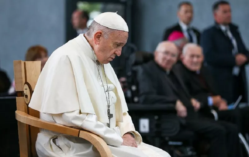 In this handout photograph received from Maxwell for WMOF18, Pope Francis prays at Knock Shrine in County Mayo on August 26, 2018, during his visit to Ireland to attend the 2018 World Meeting of Families.   / AFP PHOTO / WMOF2018/MAXWELL / Handout / RESTRICTED TO EDITORIAL USE - MANDATORY CREDIT "AFP PHOTO / WMOF18 / MAXWELL" - NO MARKETING NO ADVERTISING CAMPAIGNS - DISTRIBUTED AS A SERVICE TO CLIENTS