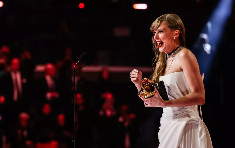 LOS ANGELES, CALIFORNIA - FEBRUARY 04: Taylor Swift accepts the Album Of The Year award for "Midnights" during the 66th GRAMMY Awards on February 04, 2024 in Los Angeles, California.   John Shearer/Getty Images for The Recording Academy/AFP (Photo by John Shearer / GETTY IMAGES NORTH AMERICA / Getty Images via AFP)