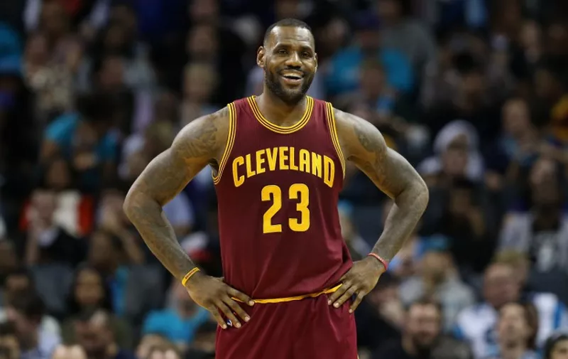 CHARLOTTE, NC - NOVEMBER 27: LeBron James #23 of the Cleveland Cavaliers reacts during their game against the Charlotte Hornets at Time Warner Cable Arena on November 27, 2015 in Charlotte, North Carolina. NBA - NOTE TO USER: User expressly acknowledges and agrees that, by downloading and or using this photograph, User is consenting to the terms and conditions of the Getty Images License Agreement.   Streeter Lecka/Getty Images/AFP