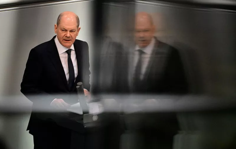 German Chancellor Olaf Scholz gives a speech during a session of the Bundestag (lower house of parliament) on March 23, 2022 in Berlin. (Photo by Tobias SCHWARZ / AFP)