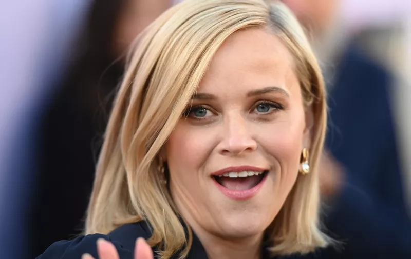(FILES) In this file photo taken on December 11, 2019 Actor Reese Witherspoon attends the Hollywood Reporter's annual Women in Entertainment Breakfast Gala, at Milk Studios in Hollywood, California. - Reese Witherspoon's women-focused production company behind television hits such as "Big Little Lies" is being purchased by a new private equity-backed venture aiming to break into Hollywood's fast-expanding streaming market. (Photo by Robyn Beck / AFP)