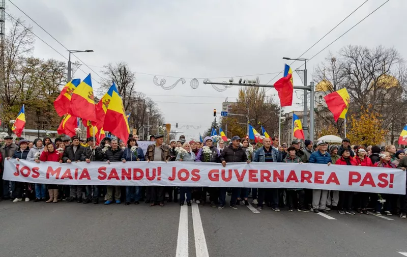 CHISINAU, MOLDOVA - NOVEMBER 13: Several thousand protesters calling Moldova's pro-Western leaders to leave the high office march toward the Constitutional Court for the ninth consecutive Sunday, on November 13, 2022 in Chisinau, Moldova. The small ex-Soviet state relies on Russian natural gas supplied by Gazprom and is grappling with a 40% cut in deliveries that has hurt its ability to provide enough electricity to its 2.5 million population. President Maia Sandu argues that the protests are "a hybrid war" from Moscow. Protests are an initiative of Ilan Shor convicted of fraud and found refuge in Israel in connection with a $1 billion bank scandal. Vudi Xhymshiti / Anadolu Agency (Photo by Vudi Xhymshiti / ANADOLU AGENCY / Anadolu Agency via AFP)