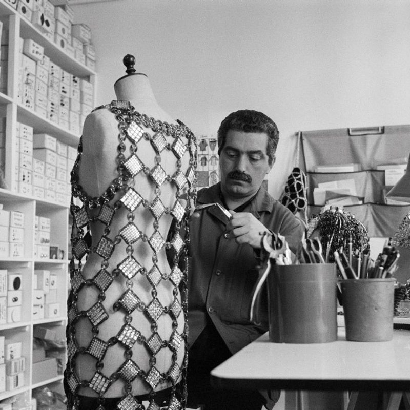 Portrait taken on July 10, 1979 shows French-Spanish fashion designer Paco Rabanne at his sewing workshop in Paris. (Photo by Pierre GUILLAUD / AFP)