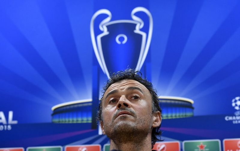 Barcelona's coach Luis Enrique looks on as he gives a press conference before a training session during the 'Open Media Day' at the Sports Center FC Barcelona Joan Gamper in Sant Joan Despi, near Barcelona on June 2, 2015. Barcelona will play the UEFA Champions League Final 2015 against Juventus at the Olympic Stadium in Berlin on June 6, 2015.   AFP PHOTO/ JOSEP LAGO