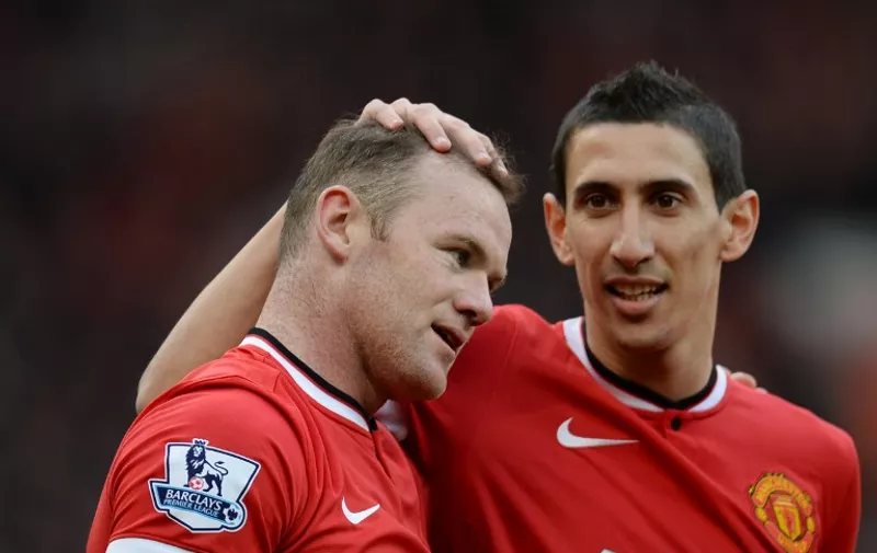 Manchester United&#8217;s English striker Wayne Rooney (L) is congratulated by Manchester United&#8217;s Argentinian midfielder Angel Di Maria (R) after scoring their second goal during the English Premier League football match between Manchester United and Aston Villa at Old Trafford in Manchester, North West England on April 4, 2015. AFP PHOTO / OLI SCARFF RESTRICTED TO [&hellip;]