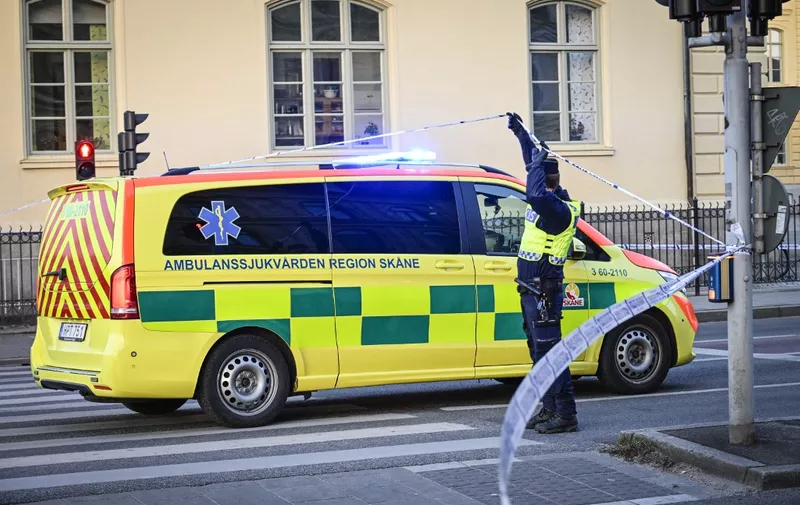 Police officers work at the scene of a reported incident at the Latin School in Malmo, Sweden on March 21, 2022 which left several people wounded. (Photo by Johan NILSSON / various sources / AFP) / Sweden OUT / The erroneous mention[s] appearing in the metadata of this photo by Johan NILSSON has been modified in AFP systems in the following manner: [reported incident] instead of [reported shooting]. Please immediately remove the erroneous mention[s] from all your online services and delete it (them) from your servers. If you have been authorized by AFP to distribute it (them) to third parties, please ensure that the same actions are carried out by them. Failure to promptly comply with these instructions will entail liability on your part for any continued or post notification usage. Therefore we thank you very much for all your attention and prompt action. We are sorry for the inconvenience this notification may cause and remain at your disposal for any further information you may require.