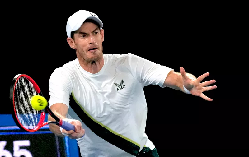 Andy Murray of Britain plays a forehand return to Matteo Berrettini of Italy during their first round match at the Australian Open tennis championship in Melbourne, Australia, Tuesday, Jan. 17, 2023. (AP Photo/Aaron Favila)
