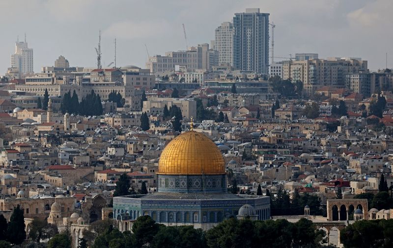 This picture taken from the Mount of Olives shows from shows Jerusalem's Old City with the Dome of the Rock in the al-Aqsa mosque compound, on January 2, 2023. (Photo by AHMAD GHARABLI / AFP)