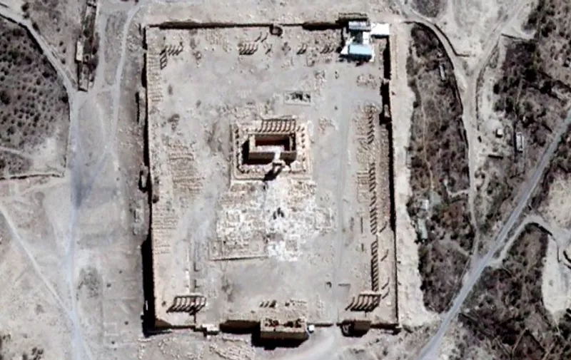 This handout picture provided on August 31, 2015 by UNITAR-UNOSAT shows a close-up of a satellite-acquired image with the Temple of Bel seen in Syria's ancient city of Palmyra on August 27, 2015. Satellite images confirm the destruction of another famed temple in Syria's Palmyra, the United Nations said late August 31, 2015. "We can confirm destruction of the main building of the Temple of Bel as well as a row of columns in its immediate vicinity," the UN training and research agency UNITAR said, providing satellite images from before and after a powerful blast in the ruins of the ancient city earlier on August 31. AFP PHOTO / UNITAR-UNOSAT /  AIRBUS DS  == RESTRICTED TO EDITORIAL USE / MANDATORY CREDIT "AFP PHOTO / UNITAR-UNOSAT / AIRBUS DS == NO MARKETING - NO ADVERTISING CAMPAIGNS  NO A LA CARTE SALES / DISTRIBUTED AS A SERVICE TO CLIENTS ==