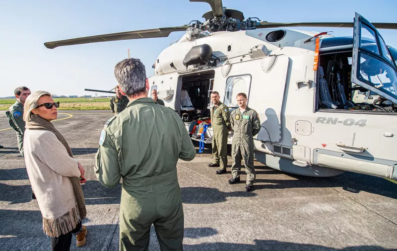 Defence minister Ludivine Dedonder looks at a NH90 helicopter during a visit of the Defence Minister to the CRC Control and Reporting Centre at the Beauvechain Military Air Base, Wednesday 23 March 2022. BELGA PHOTO JONAS ROOSENS (Photo by JONAS ROOSENS / BELGA MAG / Belga via AFP)
