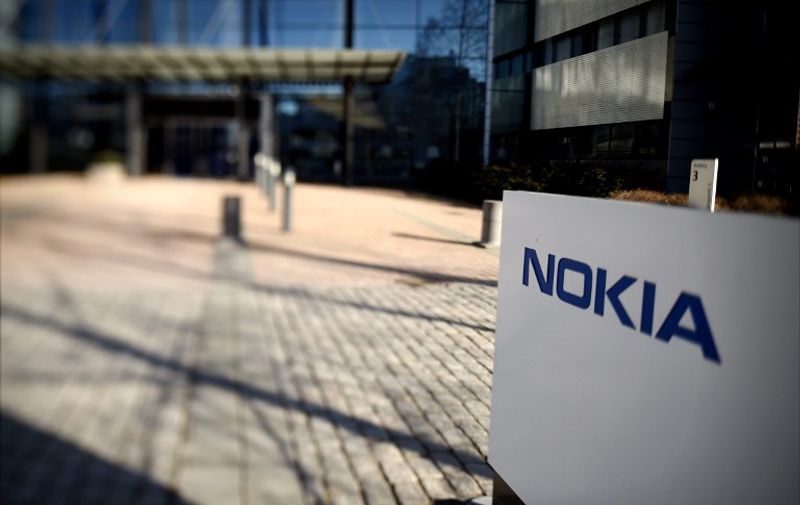 The headquarters of Finnish telecoms equipment maker Nokia in Espoo, Finland, is pictured with a tilt-shift lens on April 15, 2015. Nokia said on April 14, 2015 it was in talks to purchase all of its Franco-American rival Alcatel-Lucent, with the aim of creating a telecoms and Internet technology behemoth.    AFP PHOTO / LEHTIKUVA / Antti Aimo-Koivisto *** FINLAND OUT ***