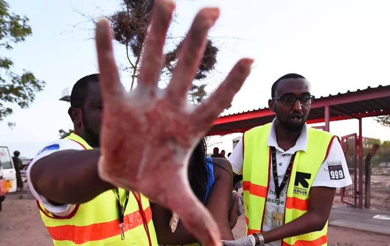 A paramedic holds his hand out as he helps a student who was injured during an attack by Somalia&#8217;s Al-Qaeda-linked Shebab gunmen on Garissa University campus on April 2, 2015. At least 70 students were massacred when Somalia&#8217;s Shebab Islamist group attacked a Kenyan university today, the interior minister said, the deadliest attack in the [&hellip;]