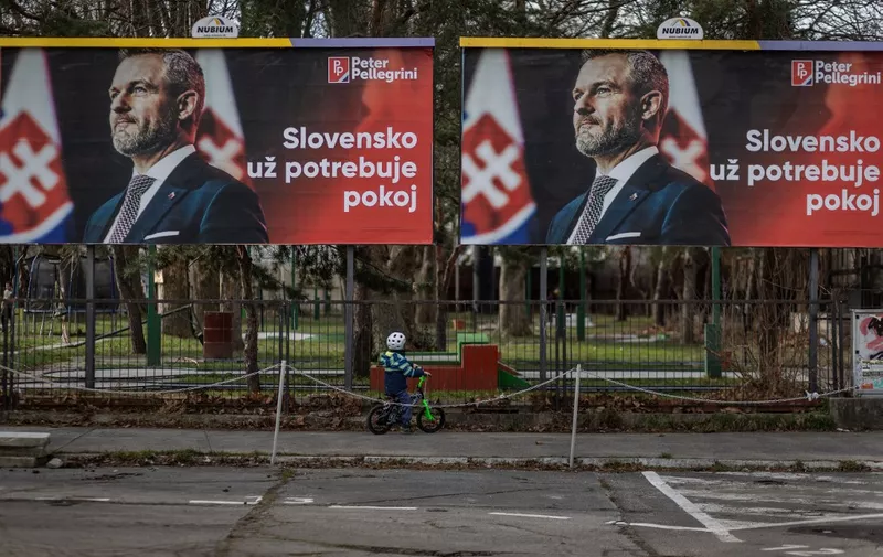 A picture taken on March 20, 2024 shows election billboards of speaker of the parliament, the head of the Hlas party and presidential candidate Peter Pellegrini which reads "Slovakia needs peace" in Bratislava . Slovaks will vote on March 23, 2024 in the first round of presidential elections seen as a race between the ruling populist government inclining toward Russia and a pro-Ukrainian candidate backed by the opposition. (Photo by TOMAS BENEDIKOVIC / AFP)