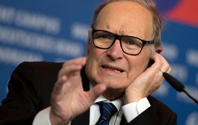 Italian composer Ennio Morricone addresses a press conference for the film "The Best Offer" presented in the Berlinale Special of the 63rd Berlin International Film Festival in Berlin on February 12, 2013. AFP PHOTO / JOHANNES EISELE / AFP PHOTO / JOHANNES EISELE