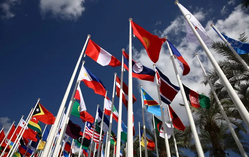 Flags at the Expo City on the opening day of the United Nations Climate Change Conference COP28 in Dubai, United Arab Emirates on November 30, 2023. (Photo by Jakub Porzycki/NurPhoto) (Photo by Jakub Porzycki / NurPhoto / NurPhoto via AFP)