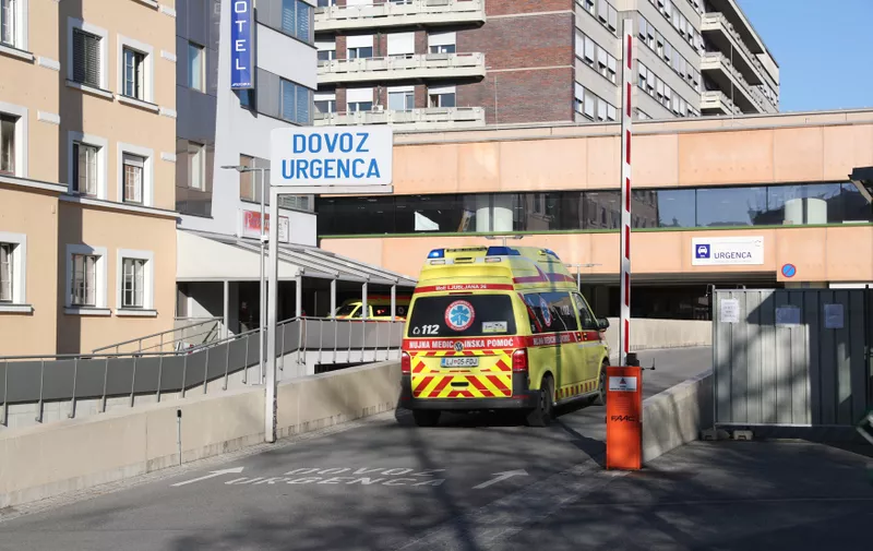 LJUBLJANA, March 17, 2020  An ambulance drives into the medical center of Ljubljana University, the main hospital for treating COVID-19 patients,  in Ljubljana, capital of Slovenia,  March 16, 2020..  The number of confirmed COVID-19 cases in Slovenia rose to 253, according to the government on Monday. .  The government decided to suspend public transport from Sunday midnight and indefinitely extend the previous decree on the closure of all educational institutions.,Image: 507114726, License: Rights-managed, Restrictions: , Model Release: no