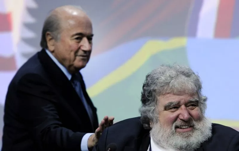 (FILES) -- A file photo taken on June 1, 2011 shows FIFA President Sepp Blatter (L) tapping the shoulder of the general-secretary of the Caribbean, North and Central American (CONCACAF) Chuck Blazer, the US official whose claims led to the suspension of Asian football chief Mohamed bin Hammam and Jack Warner of Trinidad andTobago, at the start of the 61st FIFA congress at the Zurich Hallenstadion in Oerlikon near Zurich. Sepp Blatter on June 2, 2015 resigned as president of FIFA as a mounting corruption scandal engulfed world football's governing body. The 79-year-old Swiss official, FIFA president for 17 years and only reelected on May 29, said a special congress would be called as soon as possible to elect a successor. Blatter said that the scandal-tainted FIFA needs "profound reconstruction" and that he had "thoroughly reconsidered" his presidency since his reelection.     AFP PHOTO / FABRICE COFFRINI