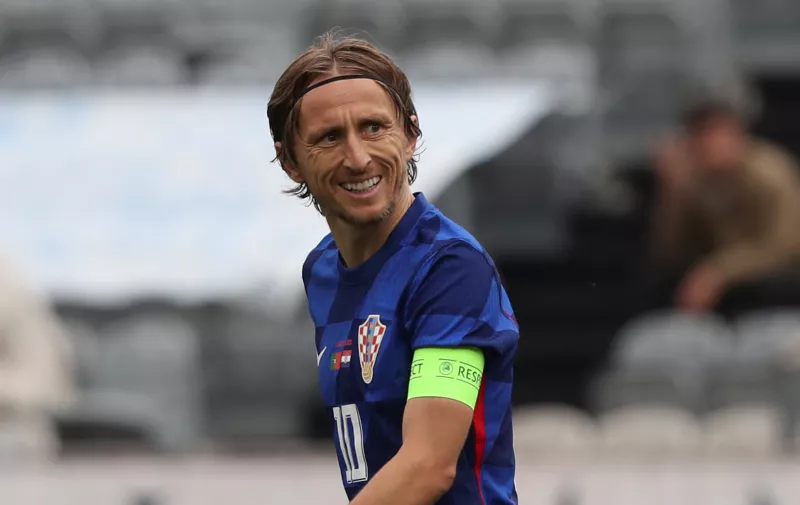 Croatia's Luka Modric celebrates after scoring his side's first goal on a penalty kick during an international friendly soccer match between Portugal and Croatia at the National Stadium in Oeiras, outside Lisbon, Saturday, June 8, 2024. (AP Photo/Pedro Rocha)