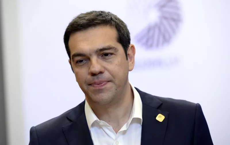 The Prime Minister of Greece Alexis Tsipras talks to the media at the end of a Special EU Euro Summit about the Greek crisis held at the EU Council building in Brussels on  June 23, 2015.  AFP Photo / Thierry Charlier