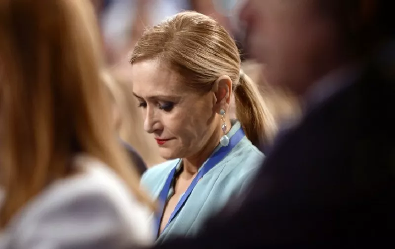 (FILES) In this file photo taken on April 8, 2018 Madrid's regional government president Cristina Cifuentes attends the national convention of ruling 'Popular Party' PP (People's Party) in Sevilla.
Cifuentes, who had been caught in a media storm over accusations she received the 2011-2012 masters degree from King Juan Carlos University (URJC) without taking all the required exams or attending lectures, resigned on April 25, 2018.
 / AFP PHOTO / CRISTINA QUICLER