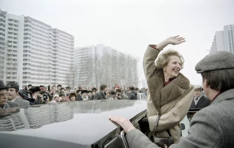British Prime Minister Margaret Thatcher greets curious Moscovites who gathered to see her on March 29, 1987 in Moscow, during her official visit in USSR.
