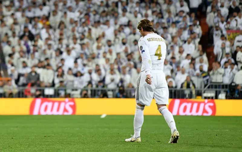 MADRID, SPAIN - FEBRUARY 26: Sergio Ramos of Real Madrid looks dejected as he leaves the pitch after receiving a red card during the UEFA Champions League round of 16 first leg match between Real Madrid and Manchester City at Bernabeu on February 26, 2020 in Madrid, Spain. (Photo by David Ramos/Getty Images)