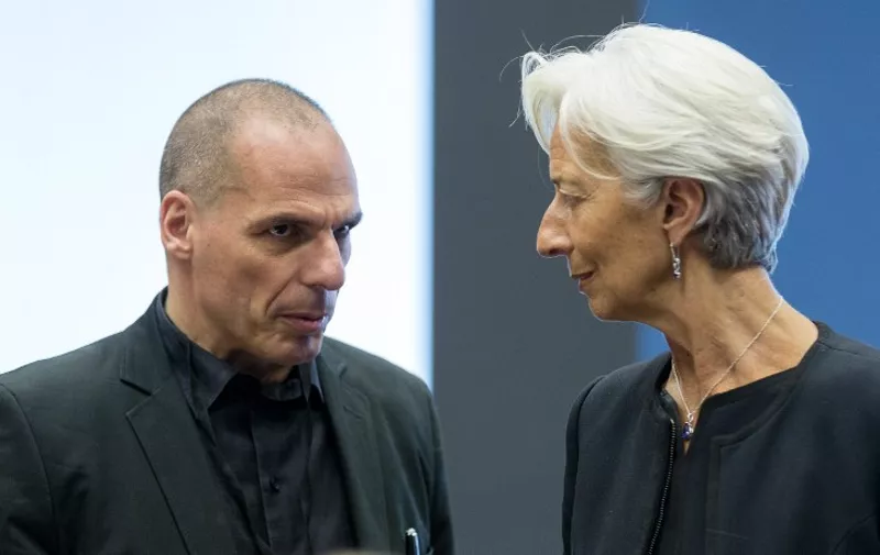 Greek Finance Minister Yanis Varoufakis (L) speaks with International Monetary Fund (IMF) Managing Director Christine Lagarde prior to a eurozone finance ministers meeting at the European Union Council headquarters in Luxembourg on June 18, 2015. Greece must make the next move towards reaching a debt deal with its EU-IMF creditors but there is little chance of an agreement at a meeting of eurozone finance ministers on June 18, Eurogroup chief Jeroen Dijsselbloem. AFP PHOTO / THIERRY MONASSE