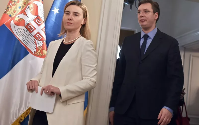 European Union foreign policy chief Federica Mogherini (L) and Serbia&#8217;s Prime Minister Aleksandar Vucic arrive for a joint press conference in Belgrade on March 27, 2015. AFP PHOTO / ANDREJ ISAKOVIC