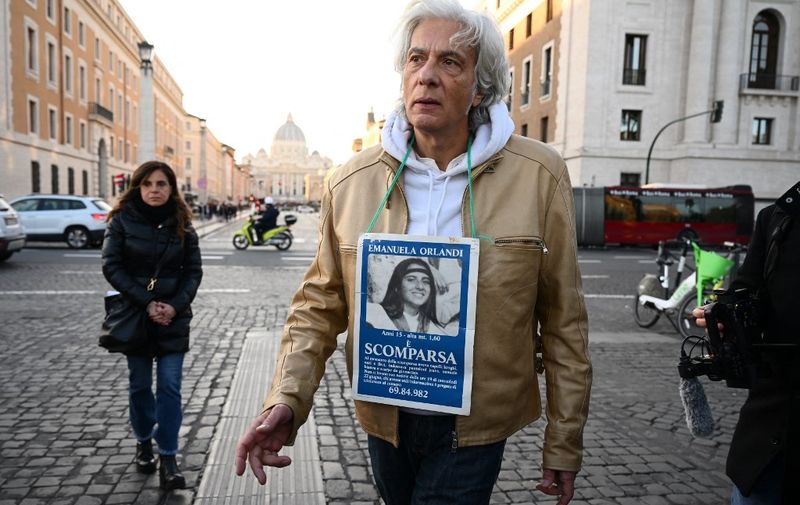 Pietro Orlandi, the brother or Emanuela Orlandi, a teenager who disappeared in 1983 in one of Italy's darkest mysteries, arrives to take part in a sit in with supporters, family and friends, behind St Peter's Square in the Vatican in Rome on January 14, 2023. - The Vatican announced on January 10, 2022 the opening of an investigation into the 1983 disappearance of a teenage girl living in the Vatican, a case that has never been solved and was the subject of a documentary on Netflix. (Photo by Vincenzo PINTO / AFP)