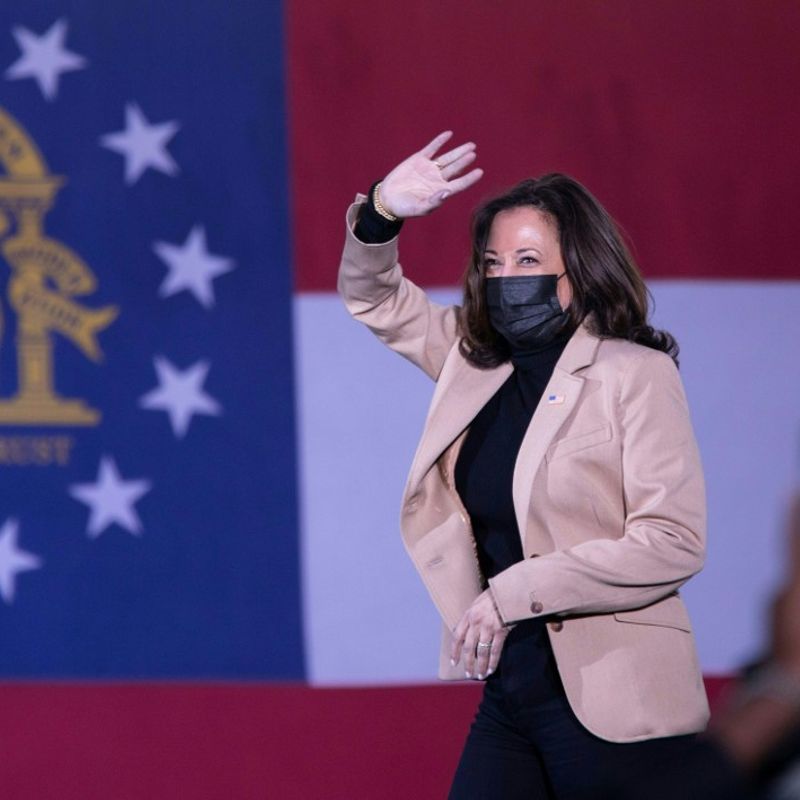 US Vice President-Elect Kamala Harris arrives to speak at a rally in support of Democratic US Senate candidates, Reverend Raphael Warnock and Jon Ossoff, at Garden City Stadium in Savannah, Georgia on January 3, 2021. - The two candidates are competing in a runoff election on January 5th that will decide which party controls the United States Senate. (Photo by Logan Cyrus / AFP)