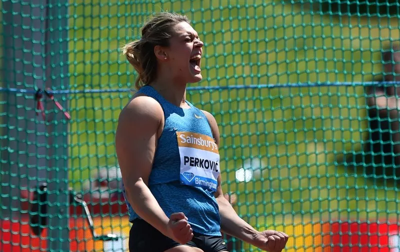Croatia's Sandra Perkovic reacts after her final throw in the women's discus throw during the IAAF Diamond League Birmingham Grand Prix athletics meeting at the Alexander Stadium in Birmingham, central England, on June 6, 2015.  AFP PHOTO / BEN STANSALL