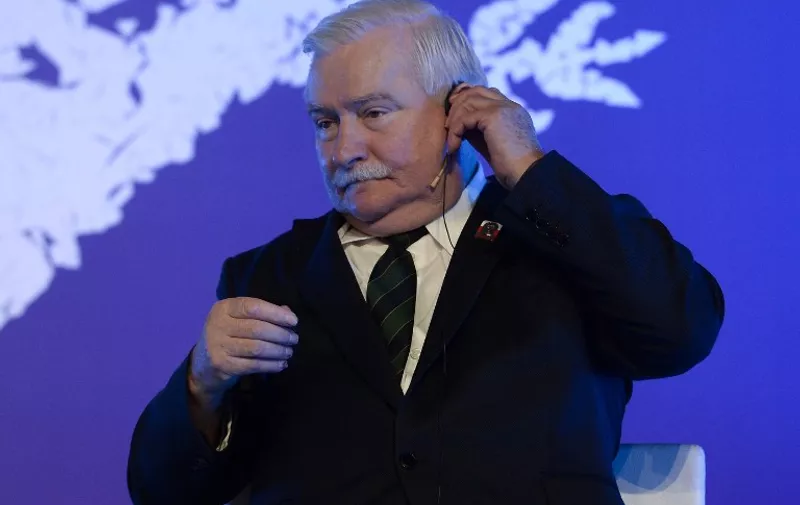 Polish 1983 Nobel peace laureate Lech Walesa sits on the second day of the XV World Summit of Nobel Peace Laureates in Barcelona, on November 14, 2015. The bloody attacks on Paris cast an emotional cloud on a Nobel Peace Prize gathering in Barcelona today, as shocked laureates poured out their sympathy for the French capital following the coordinated killings that saw 128 people die and over 200 wounded.   AFP PHOTO/ JOSEP LAGO