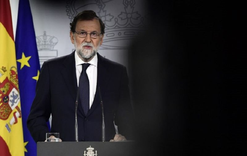 Spanish Prime Minister Mariano Rajoy speaks during a press conference at La Moncloa palace in Madrid, on September 20, 2017.
Spain's Prime Minister Mariano Rajoy called today on Catalan separatists to stop their "escalation of radicalism and disobedience" as thousands protested in Barcelona over the detention of regional officials ahead of a referendum. / AFP PHOTO / JAVIER SORIANO