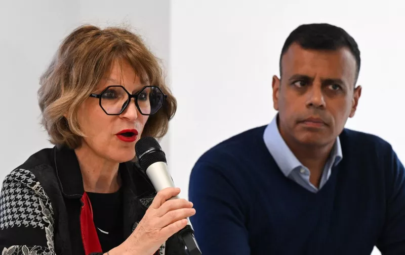 French human rights activist and Secretary General of Amnesty International Agnes Callamard (L), flanked by CEO and Acting Director of Activism and Education Amnesty International UK Sacha Deshmukh (R), speaks during a press conference, in London, on April 23, 2024, ahead of Amnesty Internationals The State of the Worlds Human Rights report. (Photo by JUSTIN TALLIS / AFP)