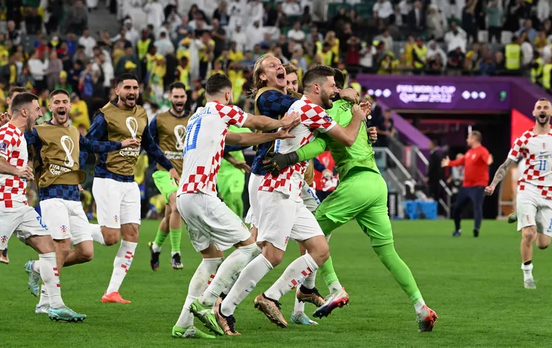 Croatia's players celebrate after winning the FIFA World Quarter-final match at Education City Stadium in Al Rayyan, Qatar on Dec.9, 2022. ( The Yomiuri Shimbun via AP Images )